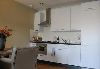 Отель Tweelwonen Kaagresort Warmond